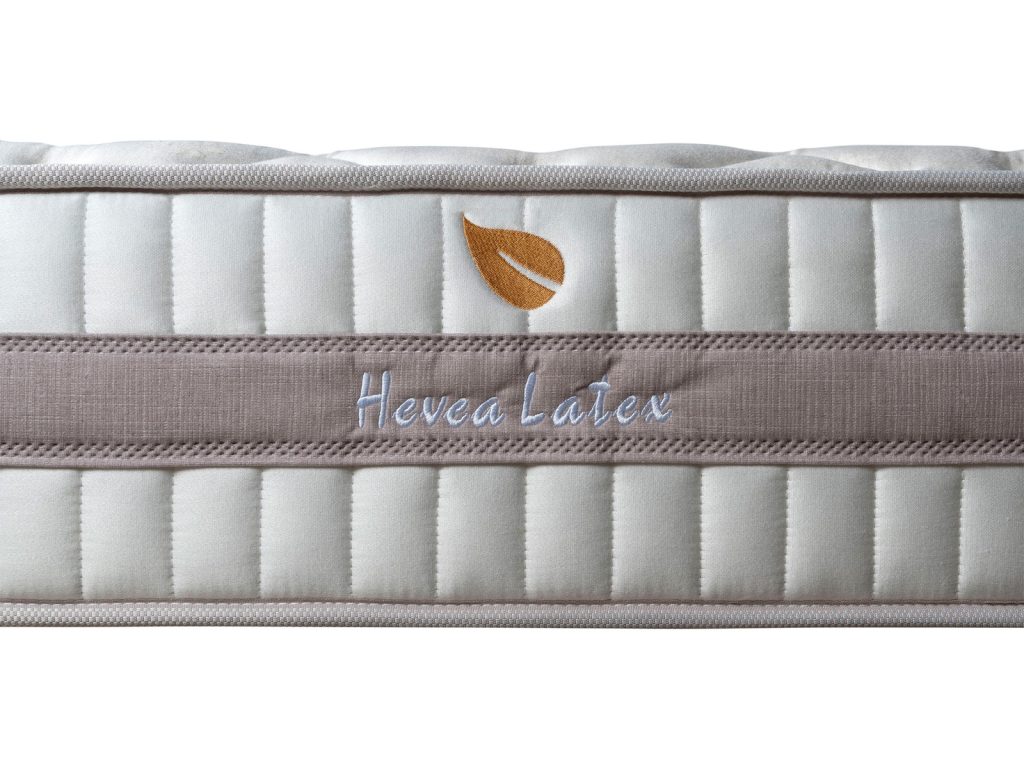 Detalle de la platabanda del colchón Dormideo Hevea Látex con su logotipo