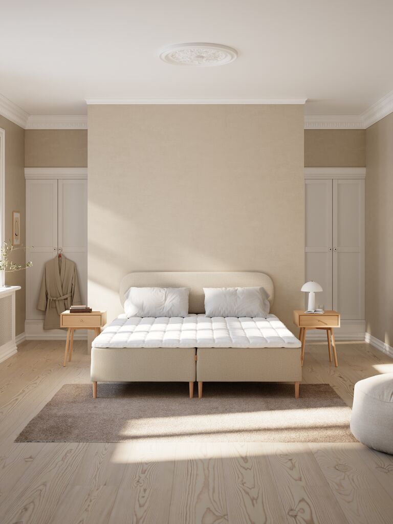 Dreamzone Gisna sobre una cama de matrimonio en un dormitorio