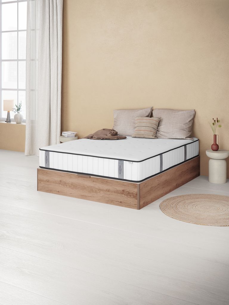 Colchón Dreamzone Ilka sobre una cama en un dormitorio