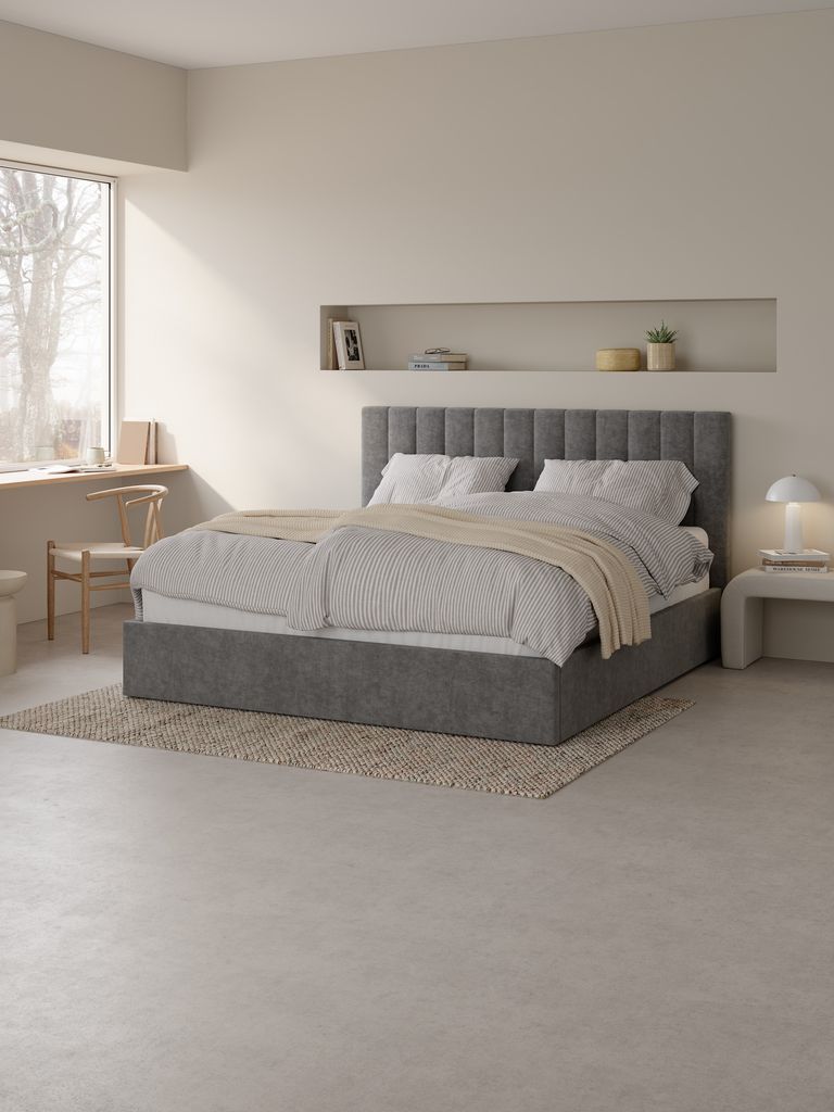 Dreamzone Kvisten sobre una cama de matrimonio en un dormitorio
