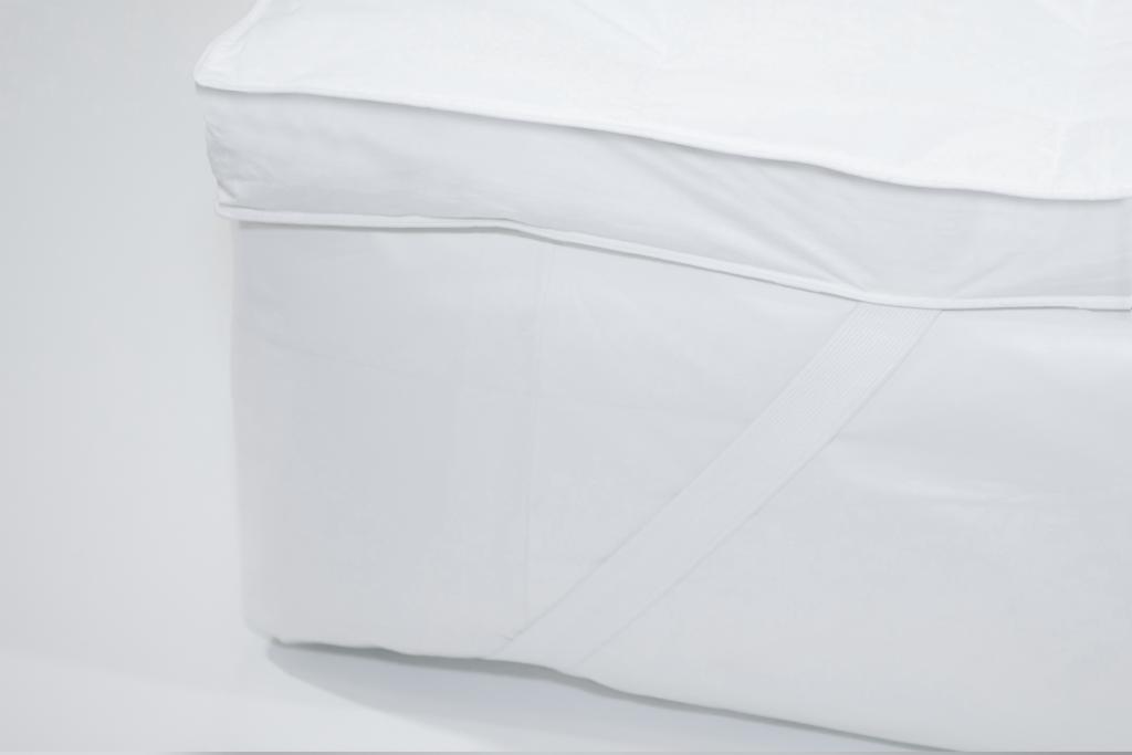 Ferdown Topper Basic, detalle del elástico en la esquina del colchón