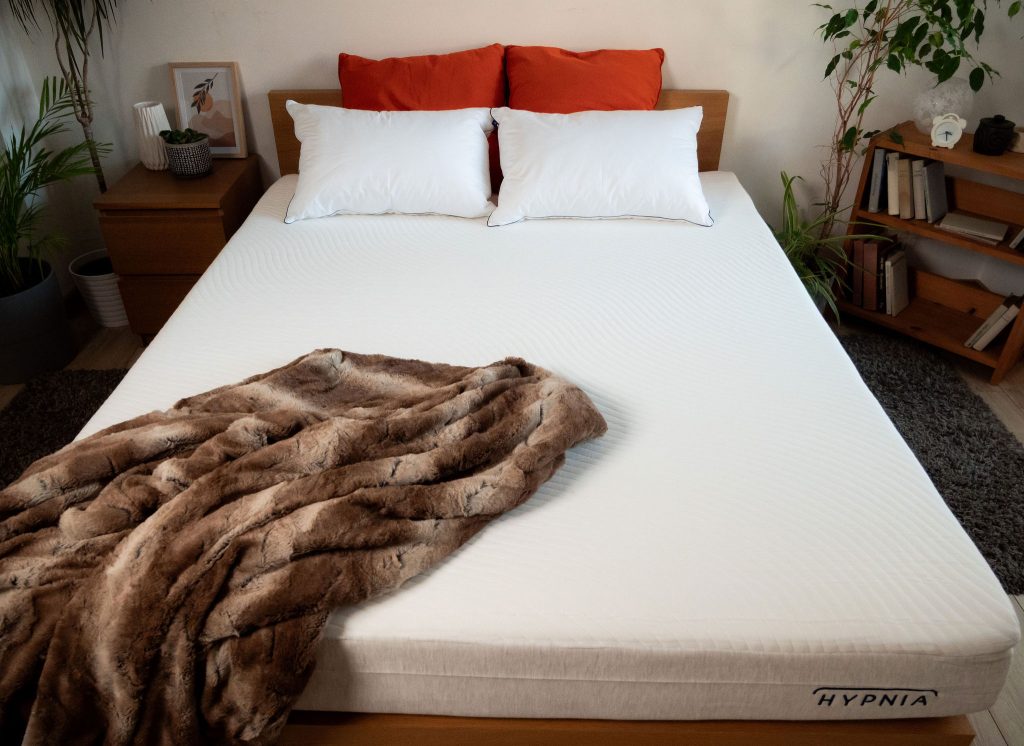 Slome Híbrido Original con almohadas y manta durante la prueba