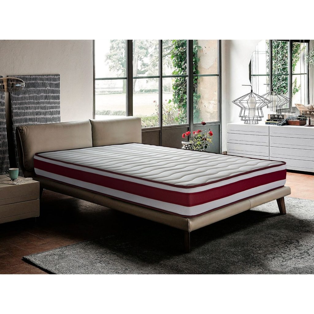 Somnalis Roll Visco 19 sobre una cama individual en un dormitorio