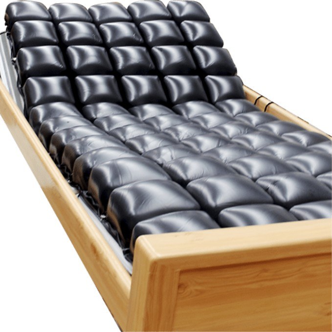 ROHO Prodigy sobre una cama con el cabecero elevado