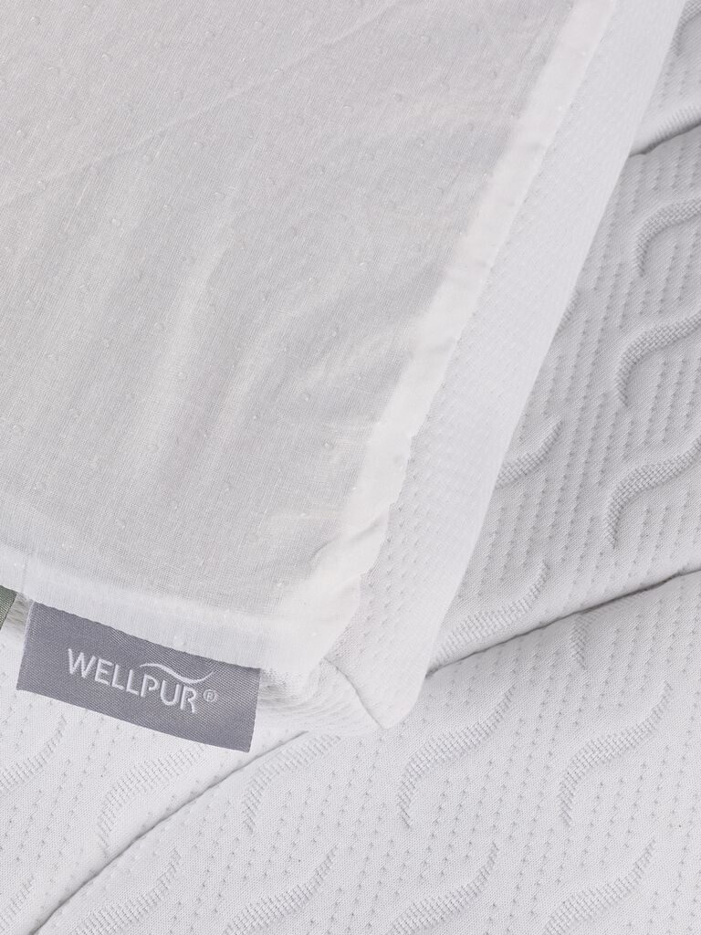WELLPUR Gulen, detalle de la funda acolchada y la etiqueta de la marca
