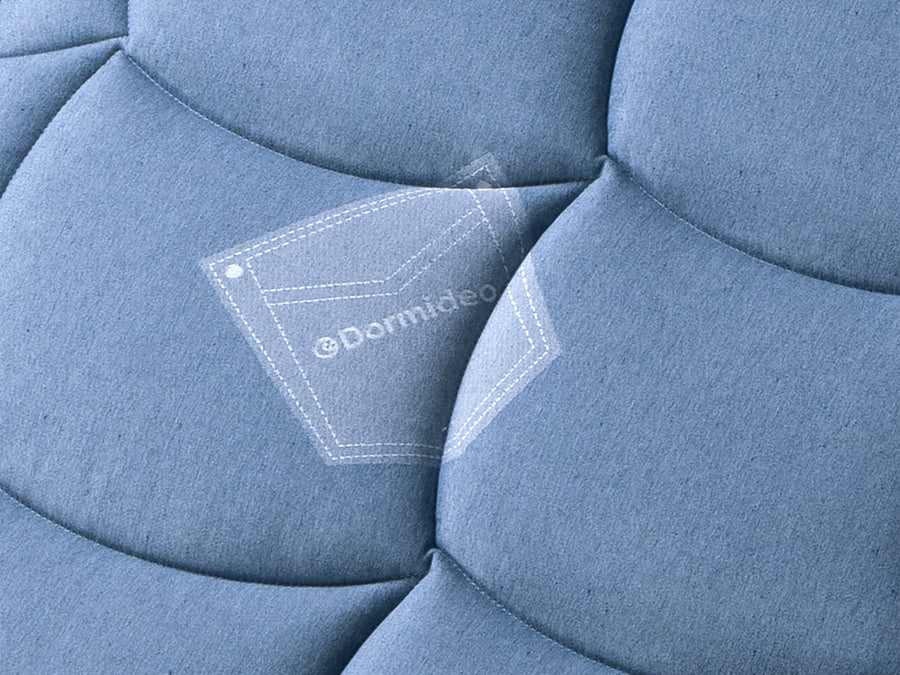 Dormideo E*Denim Jeans 15 cm, detalle del tejido vaquero acolchado con el logotipo
