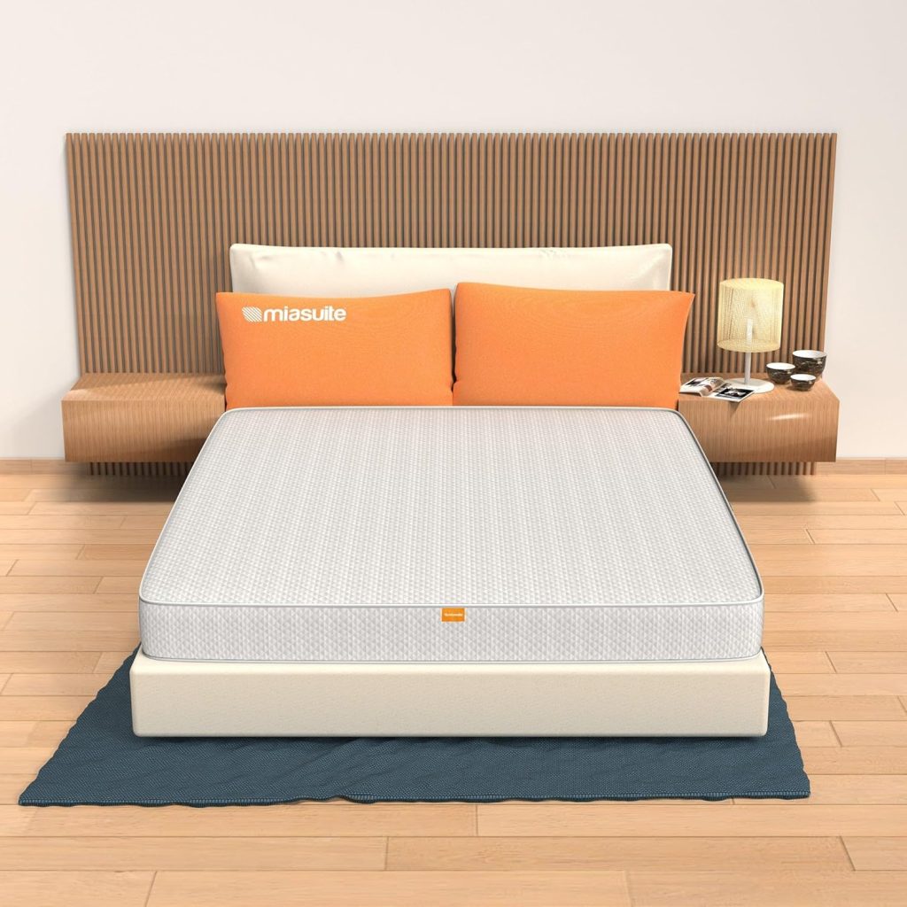 Colchón MiaSuite Primavera H14 para sofá cama sobre una cama en un dormitorio