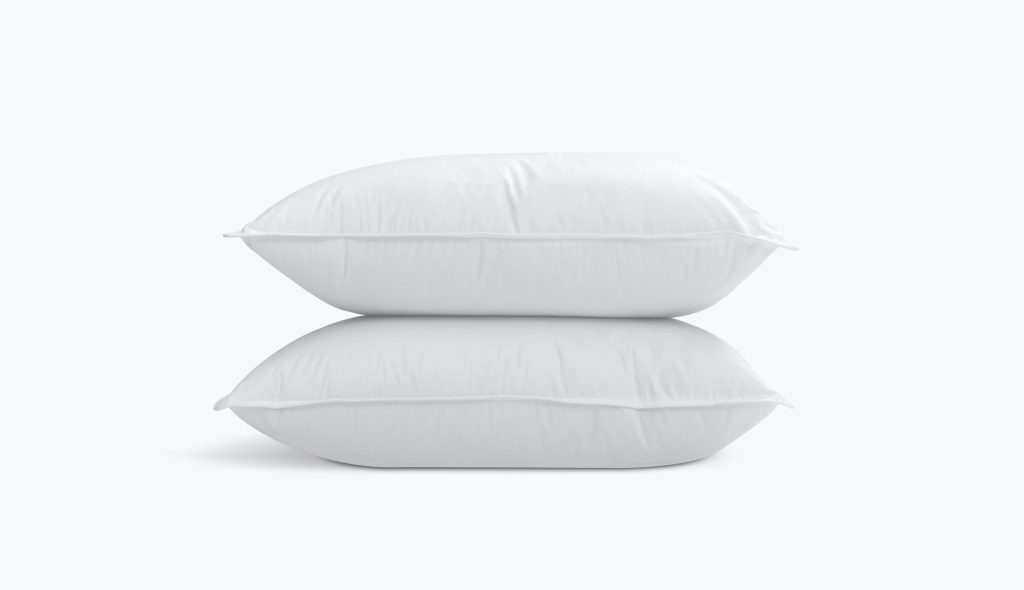 Dos almohadas Slome Almohada Híbrida apiladas sobre fondo blanco